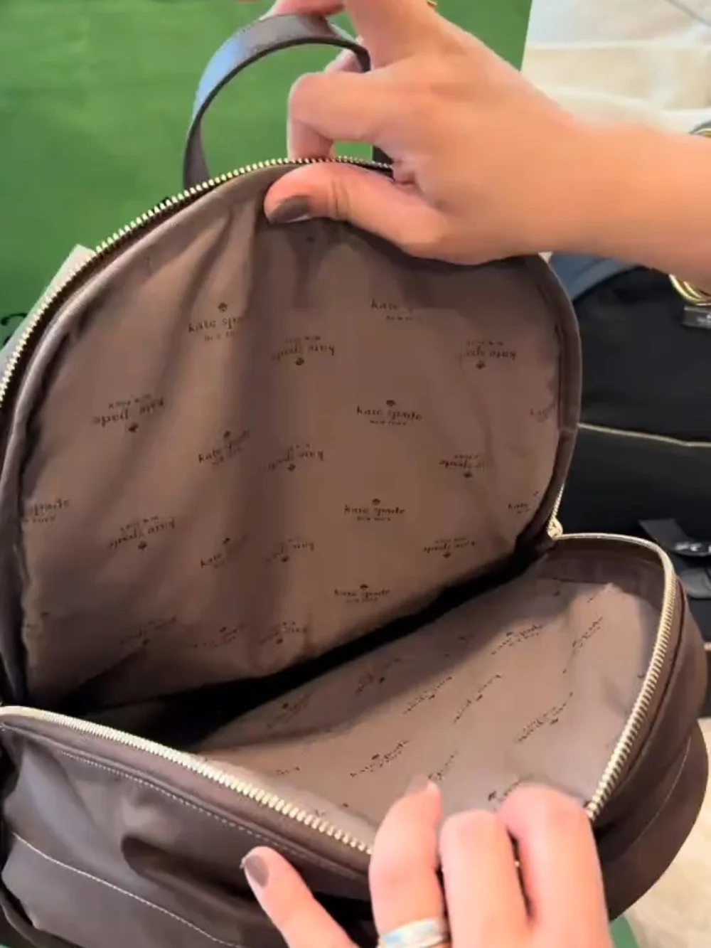 Kate Spade New York Carter Nylon Medium Dome Backpack in Hot Fudge